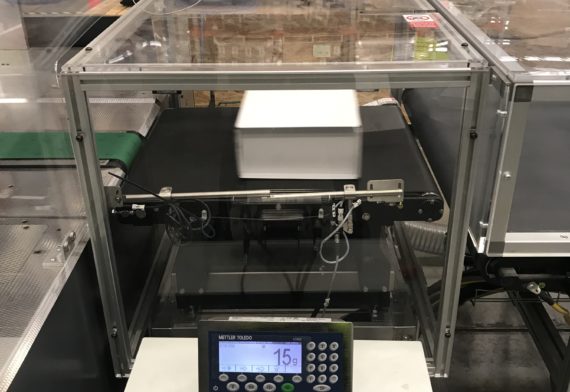 QS Warehouse AU - Automated weighing scale (carton wrap machine)