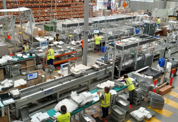QS Warehouse AU - Overview of carton wrap and satchel machine in operation